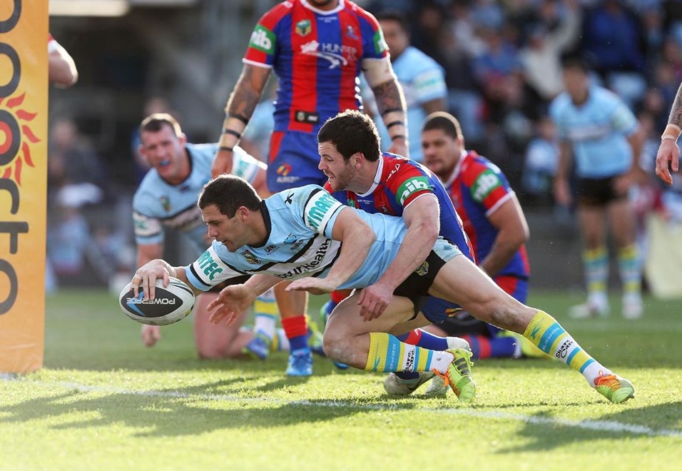 Digital Image by Robb Cox Â©nrlphotos.com: Michael Gordon about to score :NRL Rugby League - Cronulla-Sutherland Sharks V Newcastle Knights at Remondis Stadium, Sunday July 13th 2014.