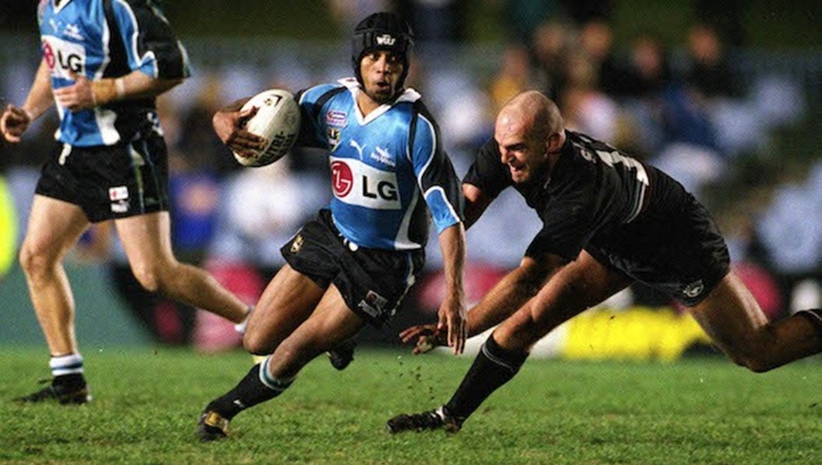 Preston Cambell Escapes  - NRL  Sharks v Penrith at Shark Park, Saturday July 14th 2001. Photographed on Colour Neg by Colin Whelan Â© Action Photographics