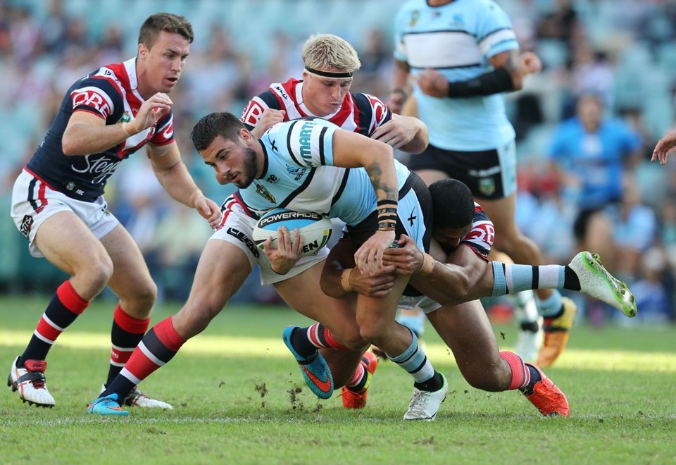 Jack Bird Wrapped up :Digital Image by Grant Trouvile Â© NRLphotos  : 2015 NRL Round 5 - Sydney Roosters v Cronulla Sharks At Allianz Stadium April 5th  2015.