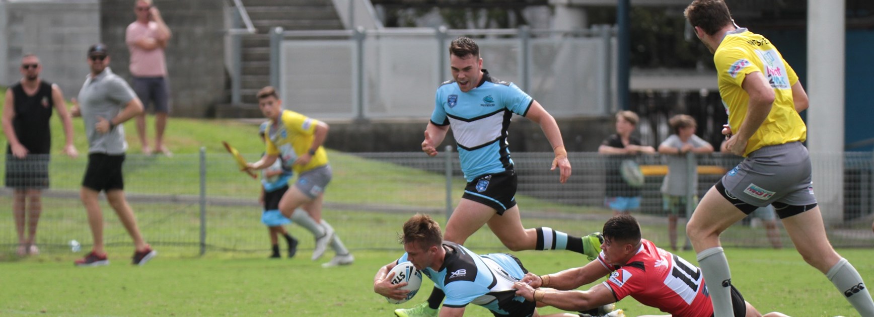 Flegg Sharks begin title defence with a win