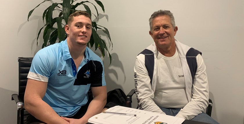 Jack Williams with dad Peter after signing his 2020 Development contract