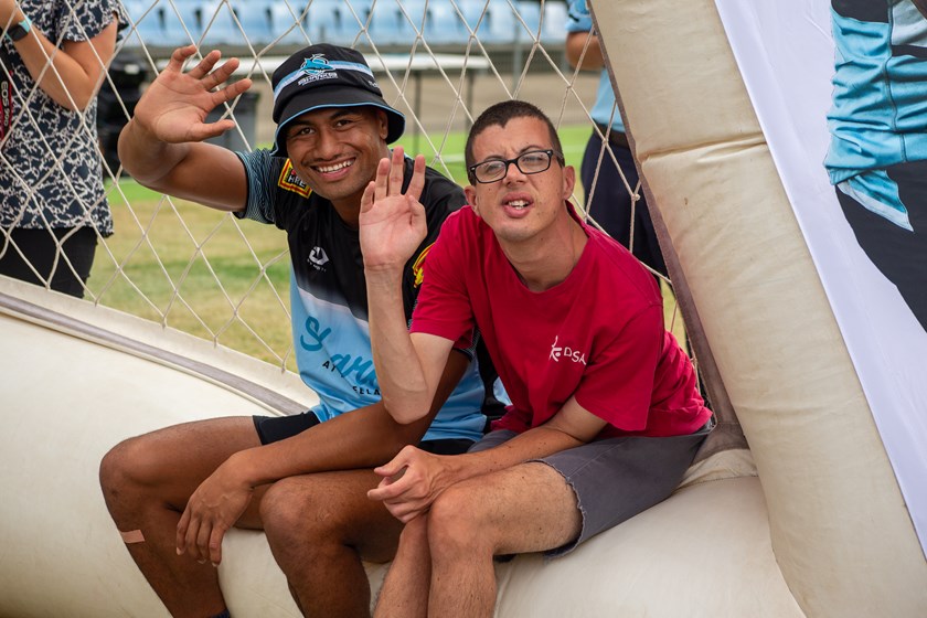 Ronaldo Mulitalo with one of the participants in the Sharks Mega Jaws program 