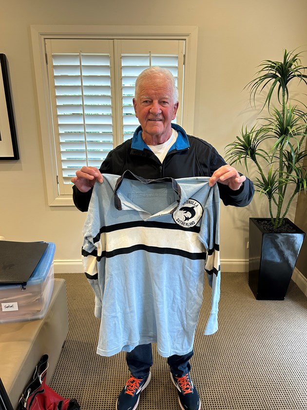 Dave Cooper showing off his 1972 Sharks jersey. 
