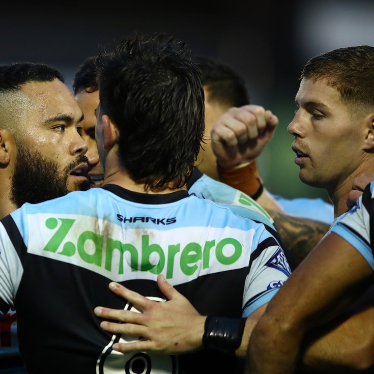 Sharks down Dragons to stay top of table