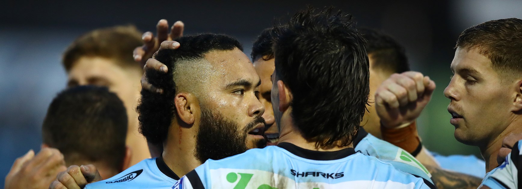 Sharks down Dragons to stay top of table