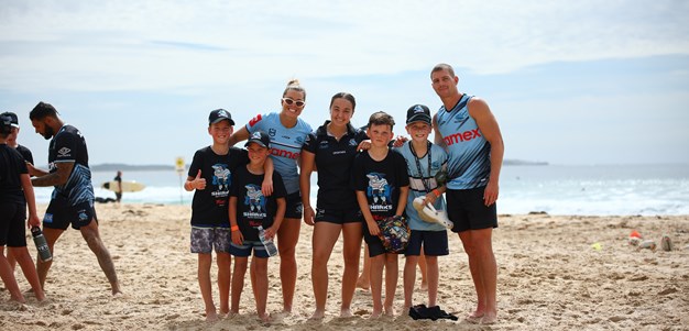 Kids flock to beach for Footy and Surf clinic
