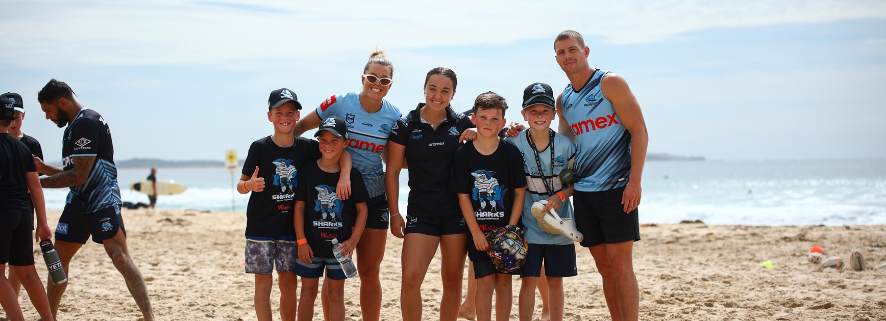 Kids flock to beach for Footy and Surf clinic