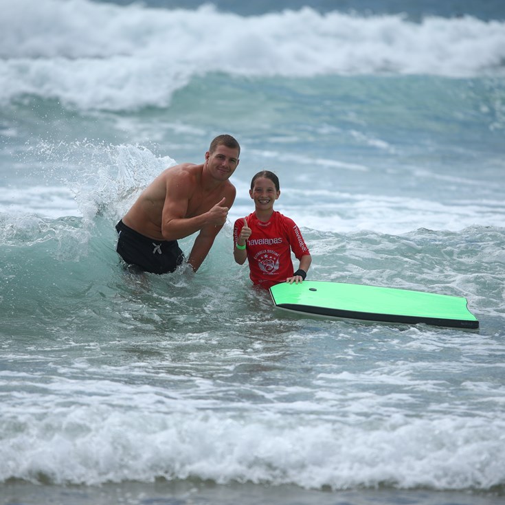 Sharks take over beach for Footy and Surf clinic