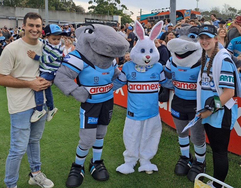Super Fan guests pose with the Sharks mascots on Easter Sunday.