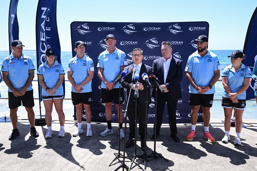 Dino Mezzatesta welcomes media to Tuesday's launch event at Cronulla Beach. 