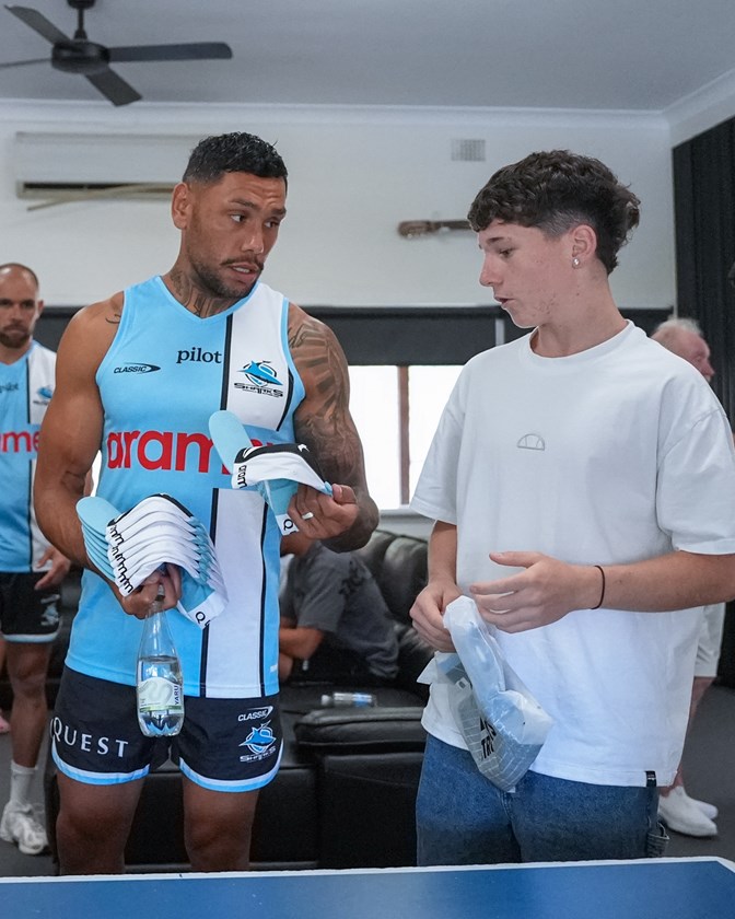 Jesse Ramien with a Kirinari Hostel resident. Credit: Tim Gray