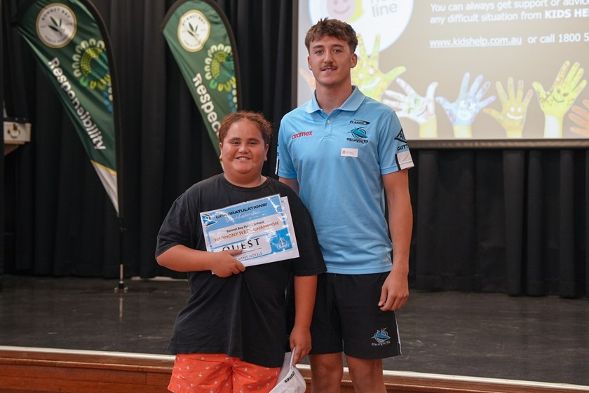Sharks NRL squad member Nikora Williams with Bonnet Bay Public School's Harmony Week Champion.