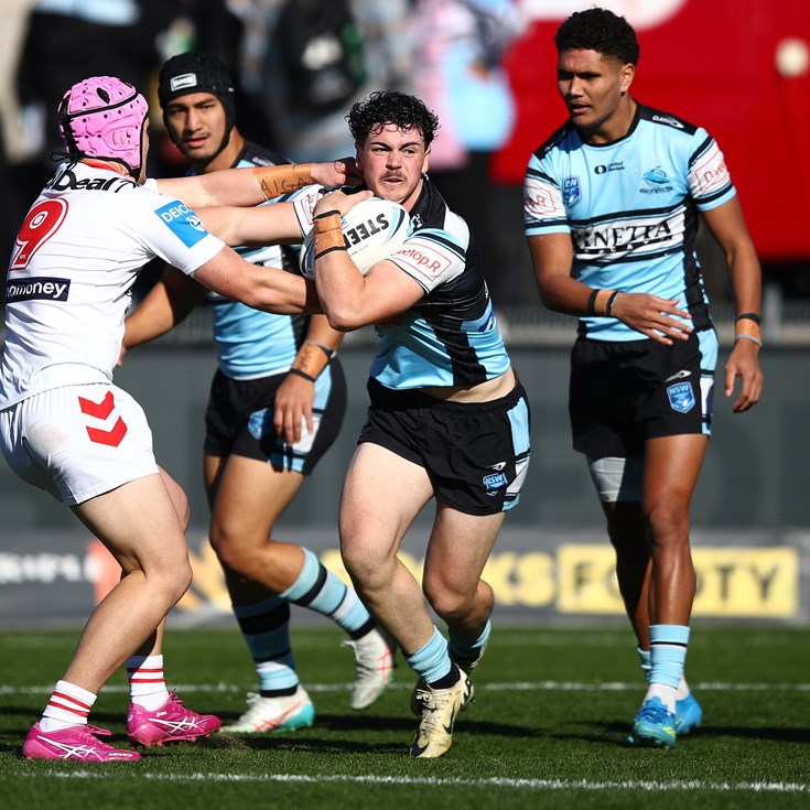 Flegg Sharks power to victory over ladder-leading Dragons.