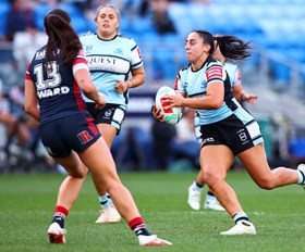 Red hot Roosters too good for brave Sharks
